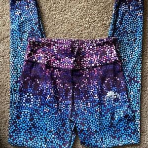 Eight pairs of women's size small leggings